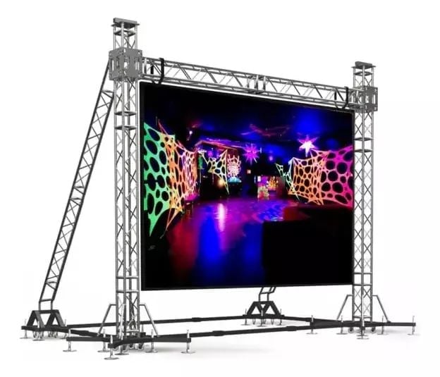 Large outdoor LED display screen mounted on metal truss structure with colorful neon graphic patterns